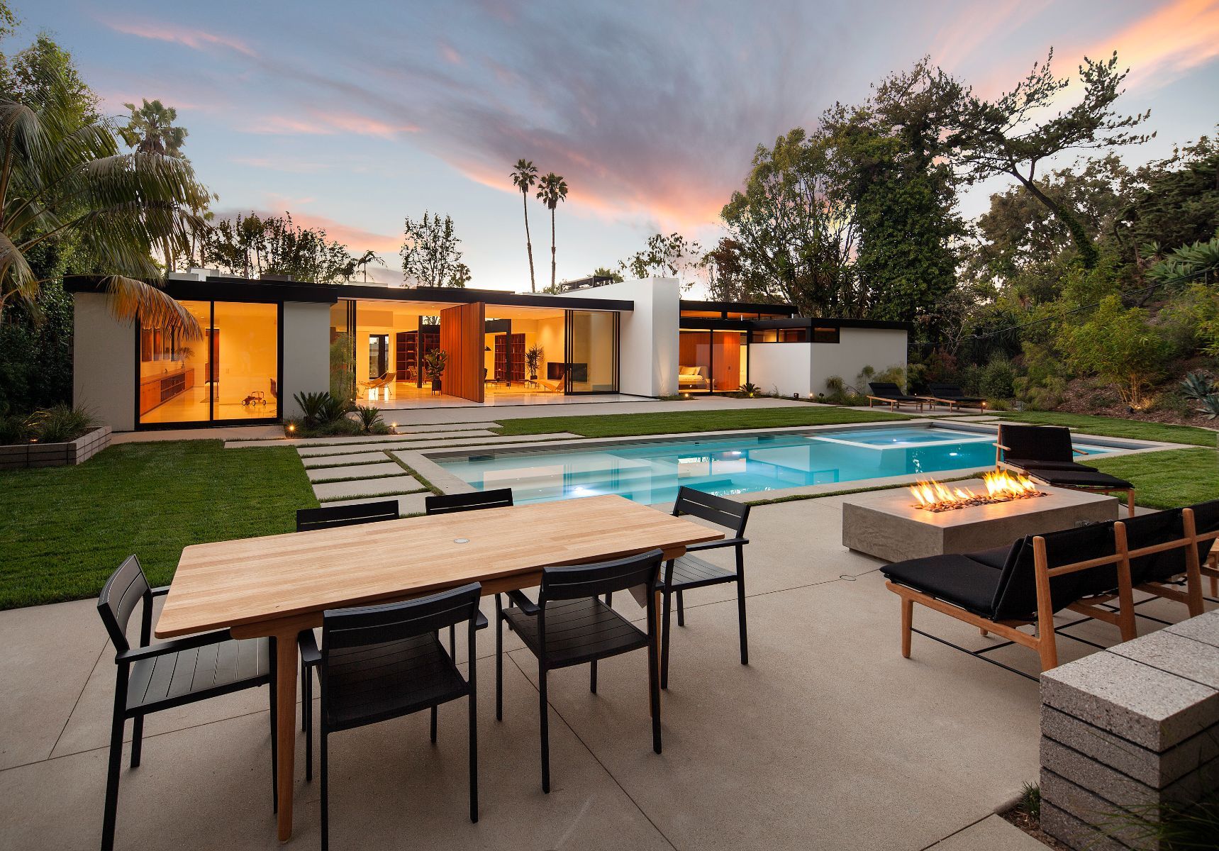 570 Evelyn Place at dusk, pool and pavilion